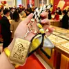 Nuevo Llavero Dorado Bufanda de Seda Versátil Cinta de Lazo Colgante para Bolso Pequeño Adorno de Regalo Venta al por Mayor de Fábrica