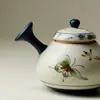 Tetera de Porcelana Azul y Blanca de las Dinastías Tang y Song con Diseño de Orquídea Mariposa Pintada en Rojo Dorado, Tetera con Asa Lateral, Juego de Té Kung Fu, Uso Doméstico, Tetera con Filtro de Agujero de Bola