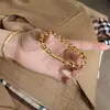 "Bombilla Pequeña" Popular Pulsera con Patrón Martillado de Cristal Blanco Pulsera de Cristal Energético para Mujeres Joyería con Cuentas