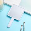 Espejo pequeño de una cara transfronterizo simple HD portátil de mano mini al por mayor cuadrado lindo espejo de maquillaje