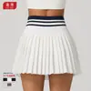 Nova saia plissada de tênis de cintura alta para outono e inverno para mulheres, saia curta esportiva para badminton com bolsos, saia falsa de duas peças anti-exposição