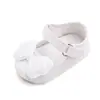 Zapatos para bebé primavera y otoño nuevos para niña con lazo lindos zapatos de princesa boca poco profunda suela de goma zapatos para niño pequeño venta al por mayor 2362