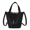 Bolso de Mano Pequeño Texturizado Transfronterizo para Mujer 2026 Nuevo Vintage Versátil Elegante Bolso Cubo para Viaje Diario Bolso de Hombro Único Bolso Cruzado