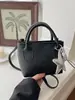 Bolsa pequena simples e estilosa para mulheres, nova bolsa tipo balde 2026, moderna e versátil, bolsa transversal feminina texturizada miu