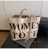 Bolso Tote Transfronterizo 2026 Estilo Nuevo para Mujer, Diseño de Letras de Alta Gama, Gran Capacidad, Estilo para Viajes Diarios, Bolso de Hombro y de Mano Personalizado
