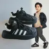 Zapatillas infantiles con puntera de concha 2026 otoño e invierno nuevas versátiles ligeras de suela blanda zapatos casuales para niños y zapatillas deportivas de moda para niñas