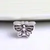 Huiyue DIY personalidad natural mariposa aleación cuentas de agujero grande pulsera accesorios de cuentas fabricantes al por mayor