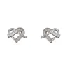 Pendientes de Corazón Nudo Completamente de Diamante Estilo Coreano Elegantes y de Moda, Exquisitos y Compactos, Lujo Ligero, Versátiles, Pendientes de Diseño Súper Brillantes para Mujer