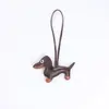 Llavero Creativo Lindo Estilo Europeo Perro Salchicha Cuero PU Colgante de Bolsa Joyería para Llaves de Coche Venta Caliente de Comercio Exterior Explosiones