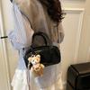Bolso de bolos de alta gama, nuevo estilo 2025, bolso Boston sencillo, bandolera de hombro a juego, pequeño bolso cuadrado para mujer.