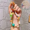 Celebridad de Internet Ins Pulsera de Pulsera de Cuentas de Dibujos Animados Japoneses y Coreanos Linda Cadena de Teléfono Móvil de Té con Leche Llavero Regalo Venta al por Mayor