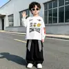 Conjunto de top y pantalón estampado retro callejero transfronterizo para niños, traje de carreras infantil, estilo motociclista, hip-hop europeo y americano, conjunto de dos piezas de corte holgado