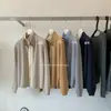 Y.JIA 2026 Outono Estilo Coreano Camisa Sofisticada Color Block com Gola Alta e Cardigan de Tricô Falso Duas Peças 578