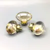Venta al por mayor del fabricante de alta gama, lujo ligero, estilo europeo, huevo de paloma de cristal, tirador de cajón de un solo agujero, tirador de gabinete de mesita de noche, zapatero