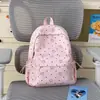 Nova Mochila Escolar para Meninas Ins Nicho Alta Aparência Mochila de Estrelinhas para Alunos do Ensino Fundamental Estilo Coreano Grande Capacidade Mochila para Ensino Médio