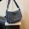 Bolso de mezclilla de moda para mujer 2026 nuevo modelo multibolsillo gran capacidad bandolera ligero versátil para el trabajo cruzado