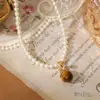 Ani Beni Original Otoño e Invierno Versátil Perla Ojo de Tigre Natural Piedra Collar para Mujer Cadena de Suéter de Cuentas de Piedra Asimétrica