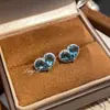 Aretes de Mariposa de Gelatina con Diamantes Crujientes Alrededor en Forma de Corazón de Gota de Agua Lujo Ligero Super Hada Aretes de Lazo de Amor Azul Londres para Mujeres