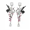 Pendientes vintage de plata con incrustaciones de diamante en forma de grulla, estilo retro, pendientes llamativos con un toque lujoso y sofisticado.