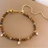 Pulseira de Olho de Tigre Banhada a Ouro Real Zircônia Trevo Pulseira de Luxo Leve Pulseira de Temperamento de Alta Qualidade Pulseira Versátil para Mulheres
