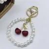 Llavero de Cereza de Moda Retro Europeo y Americano Más Vendido Transfronterizo con un Toque de Alta Gama, Accesorio Colgante de Fruta de Cereza para Bolsa