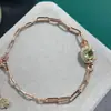 Pulseira de prata esterlina S925 turmalina verde natural design de nicho moda pulseira oval 5*7mm suporte vazio atacado