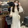 Vestido de Outono 2026 Novo Estilo Palácio Decote V Manga Longa, Estilo Francês, Muito Elegante, Vestido Emagrecedor na Cintura para Mulheres