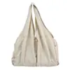 Bolsa de tela ligera casual de gran capacidad transfronteriza para mujer, nuevo bolso versátil simple para el hombro o debajo del brazo 2025, bolsa de mano para el trabajo