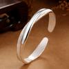 Nueva pulsera abierta artesanal esmerilada chapada en plata de ley 999, pulsera de amor entrelazada, joyería de plata japonesa y coreana para mujer al por mayor