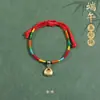 Pulseira de corda colorida zongzi do Festival do Barco-Dragão 2026 novo modelo pulseira trançada artesanal étnica infantil atacado corda vermelha