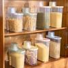 Tarro de almacenamiento de granos transparente para el hogar, caja de almacenamiento de alimentos secos para la cocina, tarro de plástico sellado, tarro de granos impermeable