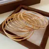 Pulseira de Braço Banho de Ouro Real Transfronteiriça Europeia e Americana Pulseira de Temperamento Simples Exagerada Moda Versátil Pulseira de Alta Qualidade para Mulheres