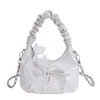 Bolso cruzado de nicho estilo coreano 2026 Verano Nuevo Versátil Lazo Plisado Ins Bolso de diseñador para mujer tipo Dumpling