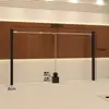 Estante de exhibición para tienda de ropa acero inoxidable negro montado en la pared perchero para colgar ropa oferta especial del comprador estante de exhibición de ropa estante para tienda de ropa de mujer