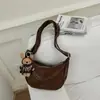 Bolsa feminina de grande capacidade, nova coleção primavera/verão 2026, design de nicho, bolsa de ombro, bolsa transversal, textura de alta qualidade, bolsa em formato de bolinho