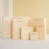 Bolsa de mano para cosméticos de alta gama bolsa para tienda de ropa color vino tinto champán bolsa de regalo bolsa de papel para joyería venta al por mayor
