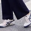 Traje esportivo casual elegante para mulheres, novo estilo primavera e outono 2026, conjunto de outono da moda de duas peças para mulheres de meia-idade e idosas