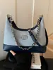 Bolsa pequena de nicho da moda para mulheres, nova bolsa popular com corrente primavera-verão 2026, bolsa de ombro e transversal requintada
