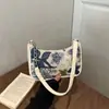 Bolso de axila de moda con flores bordadas de lentejuelas, gran capacidad, nuevo diseño floral bordado, bolso de hombro personalizado estilo chino 2026 para mujer
