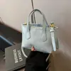 Bolsos Multicolores Transfronterizos para Mujer 2025 Nuevos de Moda Bolsos Pequeños de Gama Alta Bolsos Pequeños Cruzados de Verano Bolsos Cubo Populares