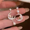 Aretes de borla de perla de luna rosa estilo francés para mujer, diseño de nicho, elegantes y con estilo, nuevos aretes 2026