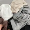 La tela se siente cómoda, bolsillo con vuelta, manga corta, manga integrada, nuevo de verano para mujer, cuello redondo, casual, suave, ceroso, camiseta