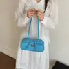 Bolsa de hombro para axila de mujer popular de verano, bolso de mano versátil de moda nuevo 2026, bolso baguette de alta gama