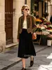 Venta caliente de AliExpress al por mayor transfronterizo 2026 nuevo estilo cuello alto textura de terciopelo estilo palacio retro chaqueta con botones