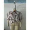 Top de gravata borboleta com novo design transfronteiriço europeu e americano 2026, gola alta, camisa casual curta de cor sólida com manga sino para mulheres
