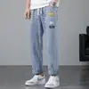 Jeans de cintura elástica para hombre rectos holgados pantalones de nueve puntos primavera y otoño modernos versátiles pantalones de pierna ancha finos pantalones de 9 puntos modernos
