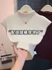 Camiseta interior de color liso con cuello alto medio para mujer, nuevo estilo de principios de otoño, capa base juvenil y versátil, mangas acampanadas pequeñas, top de moda