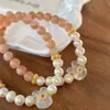 Pulsera Personalizada de Piedra Lunar Naranja Natural y Perlas de Agua Dulce con Colgante de Flor de Jade Blanco, Nueva Pulsera Estilo Chino Exclusivamente para Ventas Transfronterizas