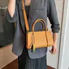 Bolsa de mão de couro encerado de alta qualidade para mulheres, nova coleção 2026, padrão trançado texturizado, bolsa quadrada pequena, bolsa transversal retrô outono/inverno