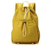 Mochila Tendência Transfronteiriça Feminina 2025 Verão Nova Mochila Feminina Bolsa de Tecido de Nylon Bolsa de Grande Capacidade Bolsa de Viagem Bolsa Escolar